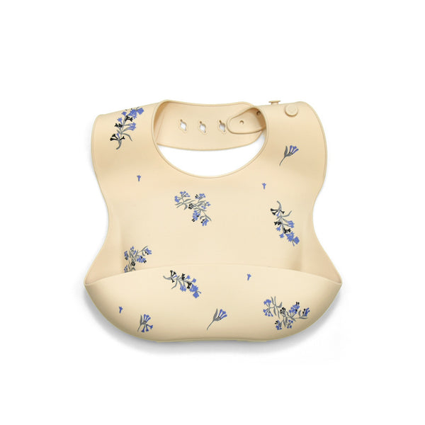 BABERO PLASTICO CREMA Y FLORES AZULES