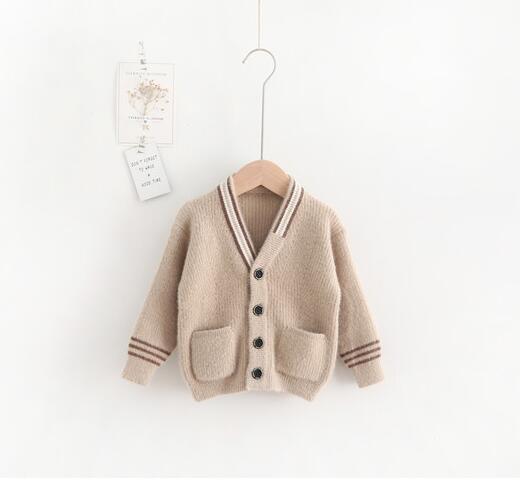 BUZO BEIGE BOTONES Y BOLSILLO