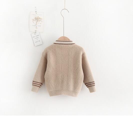 BUZO BEIGE BOTONES Y BOLSILLO