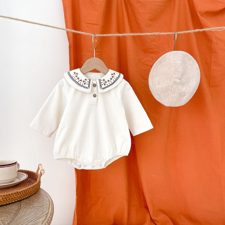 ENTERIZO CUELLO BORDADO CREMA