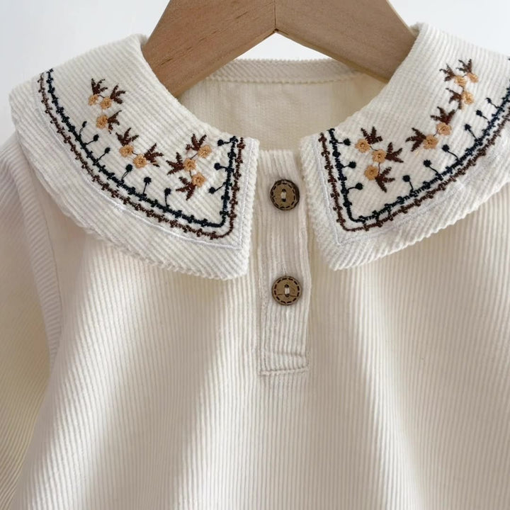 ENTERIZO CUELLO BORDADO CREMA